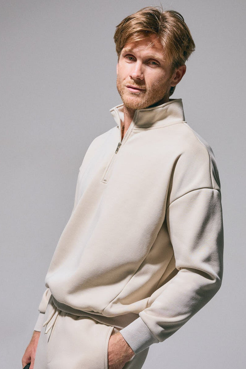 PRÉ-VENDA Sweatshirt desportiva de homem bege cardada com meio fecho