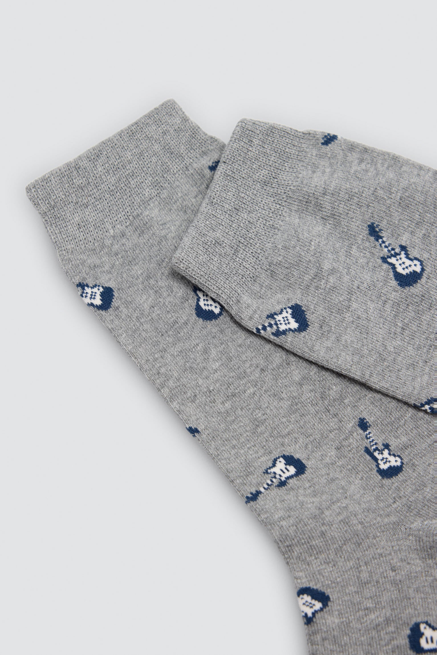 Pack de 4 meias com estampados de animais, guitarras e foguetões
