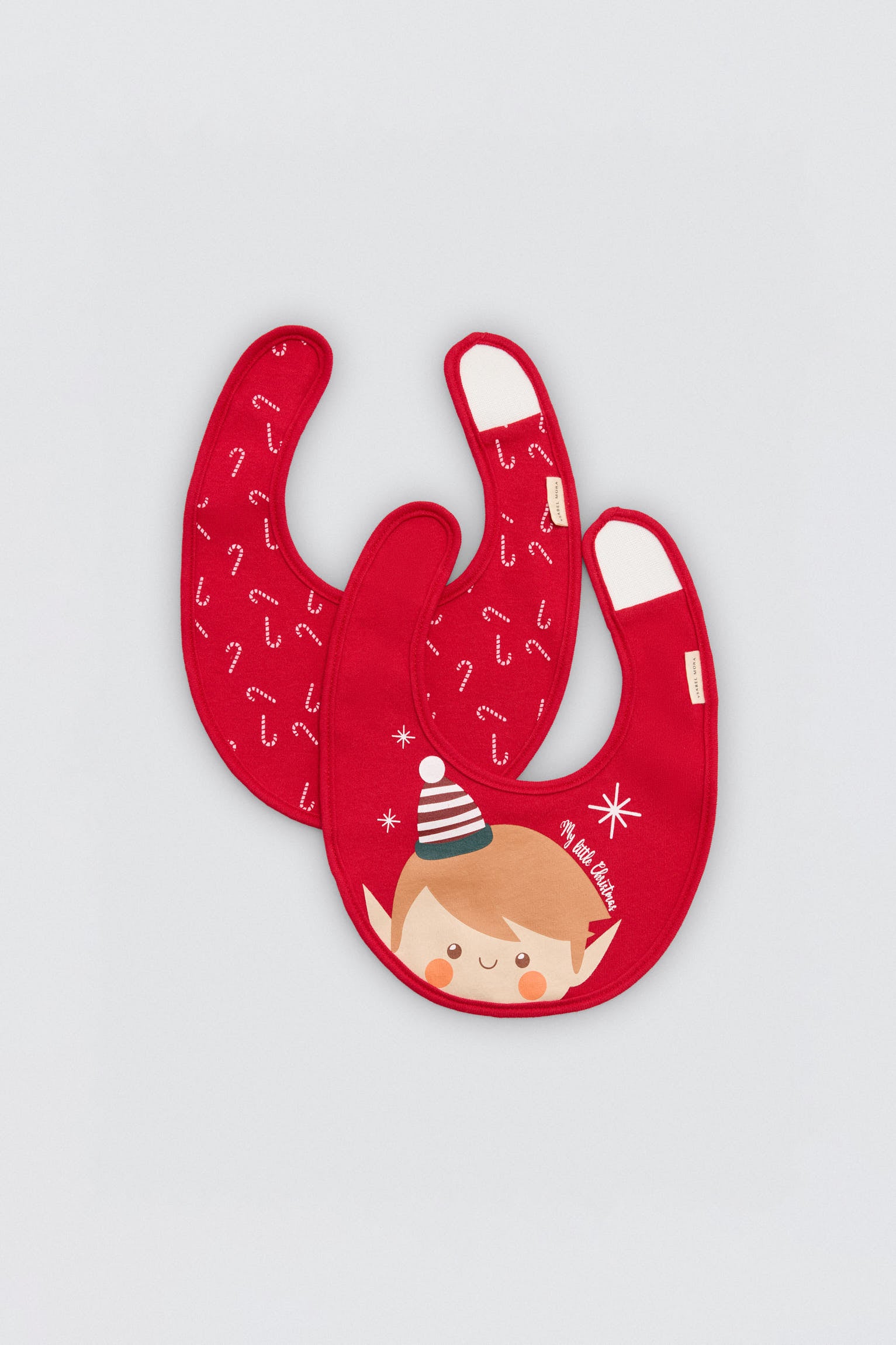 25616-1-pack-2-baberos-bebe-estampados-navidenos-ysabel-mora