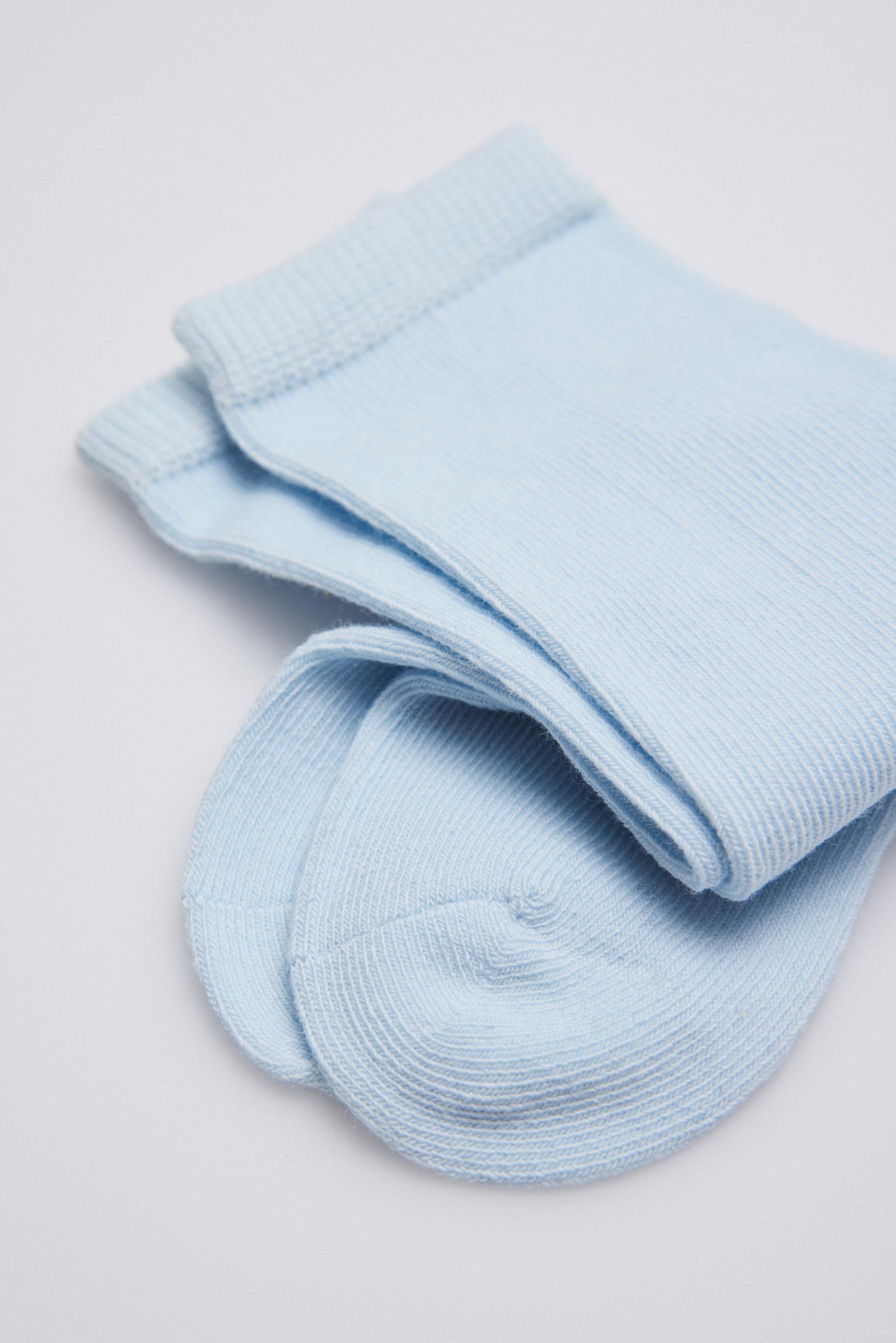 52529 2 calcetin bebe largo - Celeste