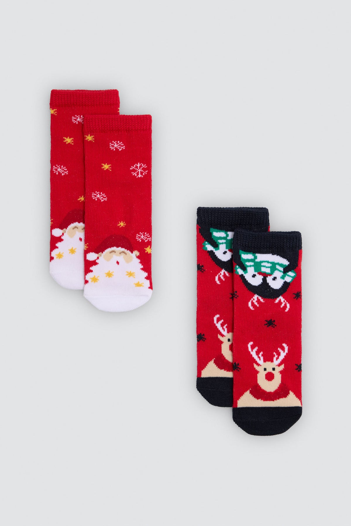Pack de 2 meias de bebé de Natal com renas e Pai Natal
