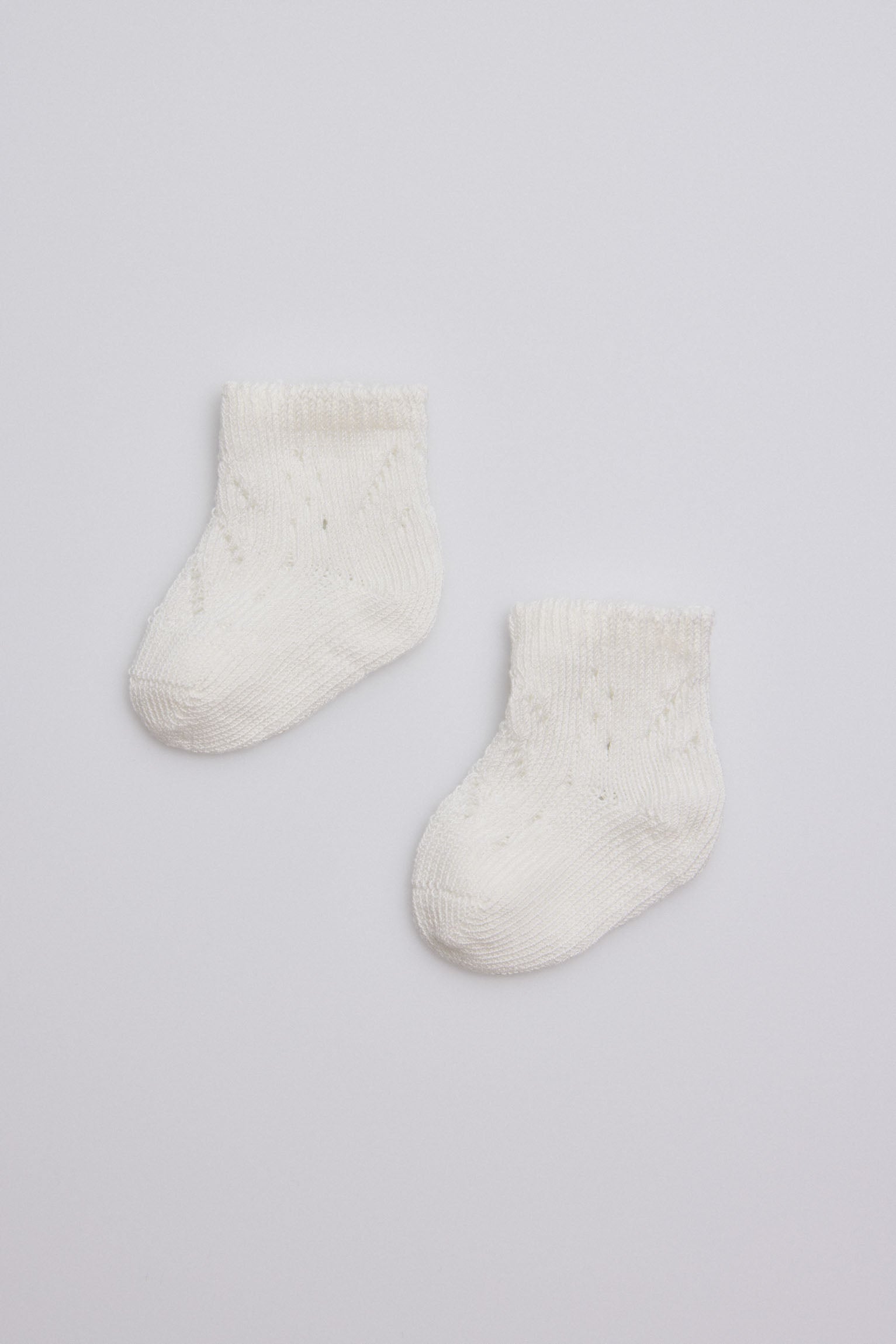 62687-201-20calcetin-20recien-20nacido-20--20Marfil-b5c2a33d-074b-4a30-b221-5786c8d4cd95