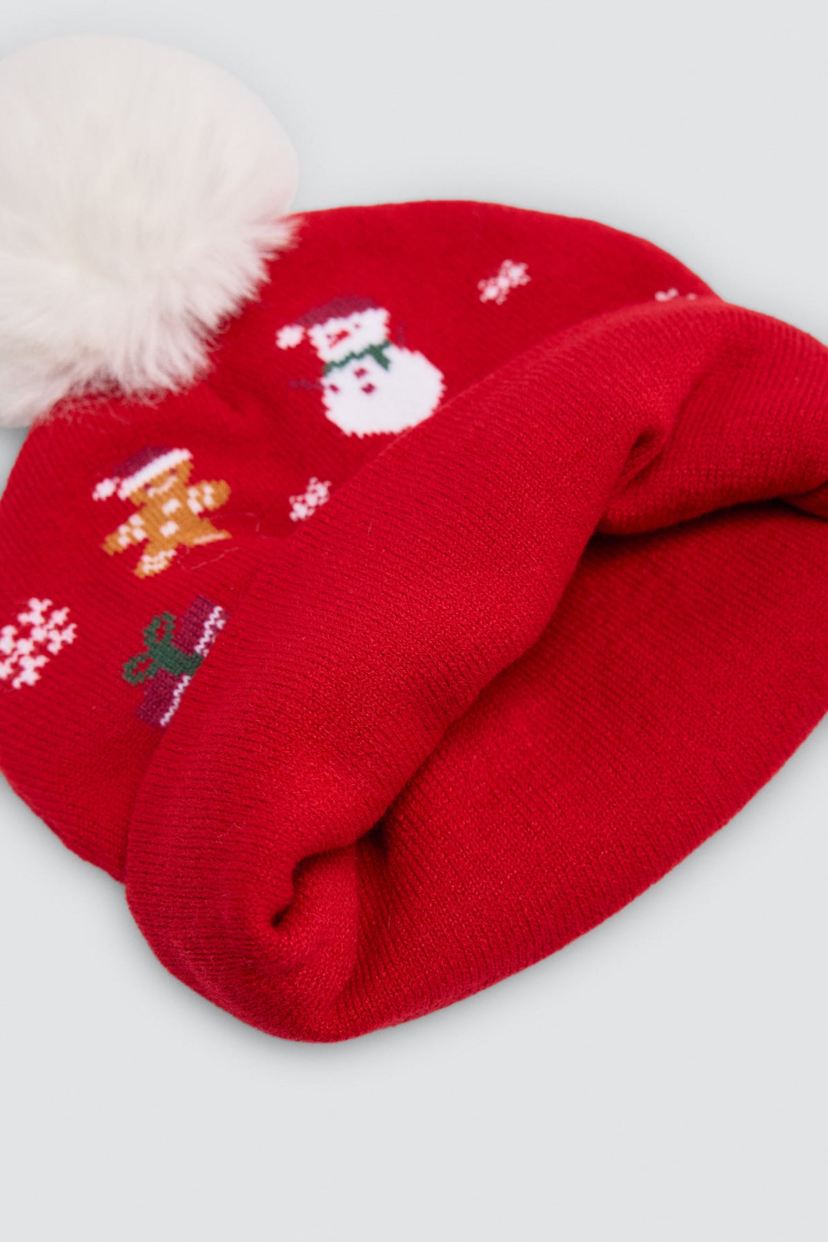Gorro unissexo com pompom e estampado de Natal