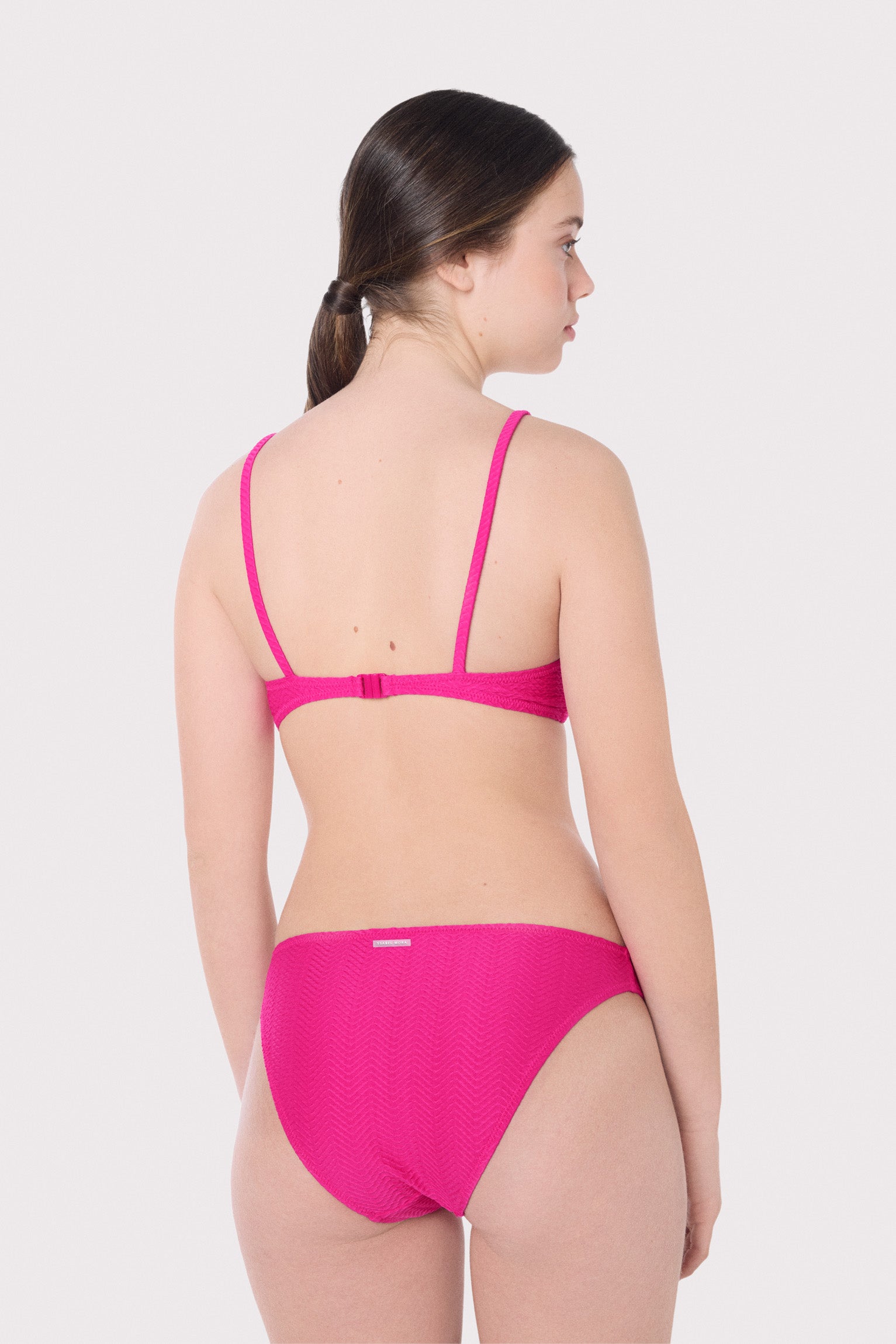 Braga bikini juvenil texturizada lisa fucsia - Ysabel Mora