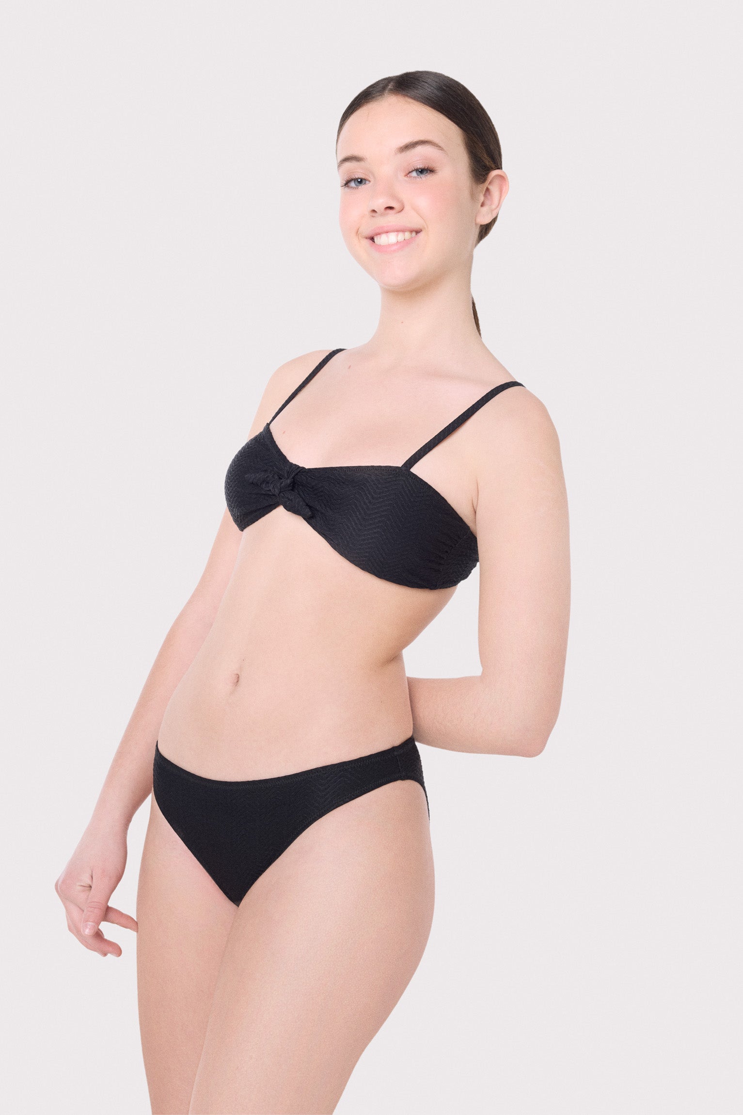 Braga bikini juvenil texturizada lisa negro - Ysabel Mora