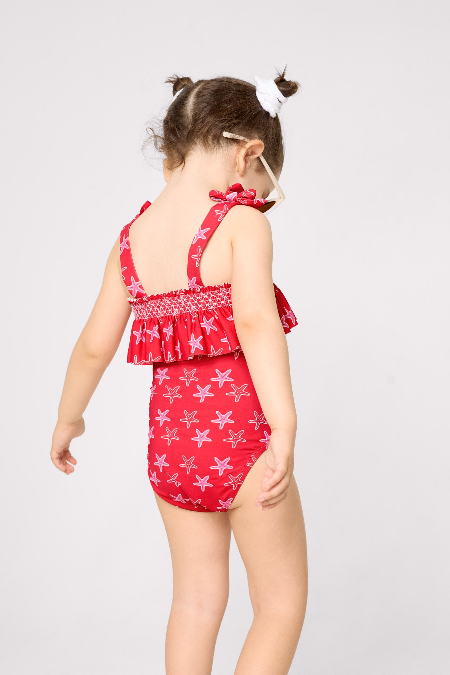 Bañador niña detalle volante estampado estrellas marinas - Ysabel Mora
