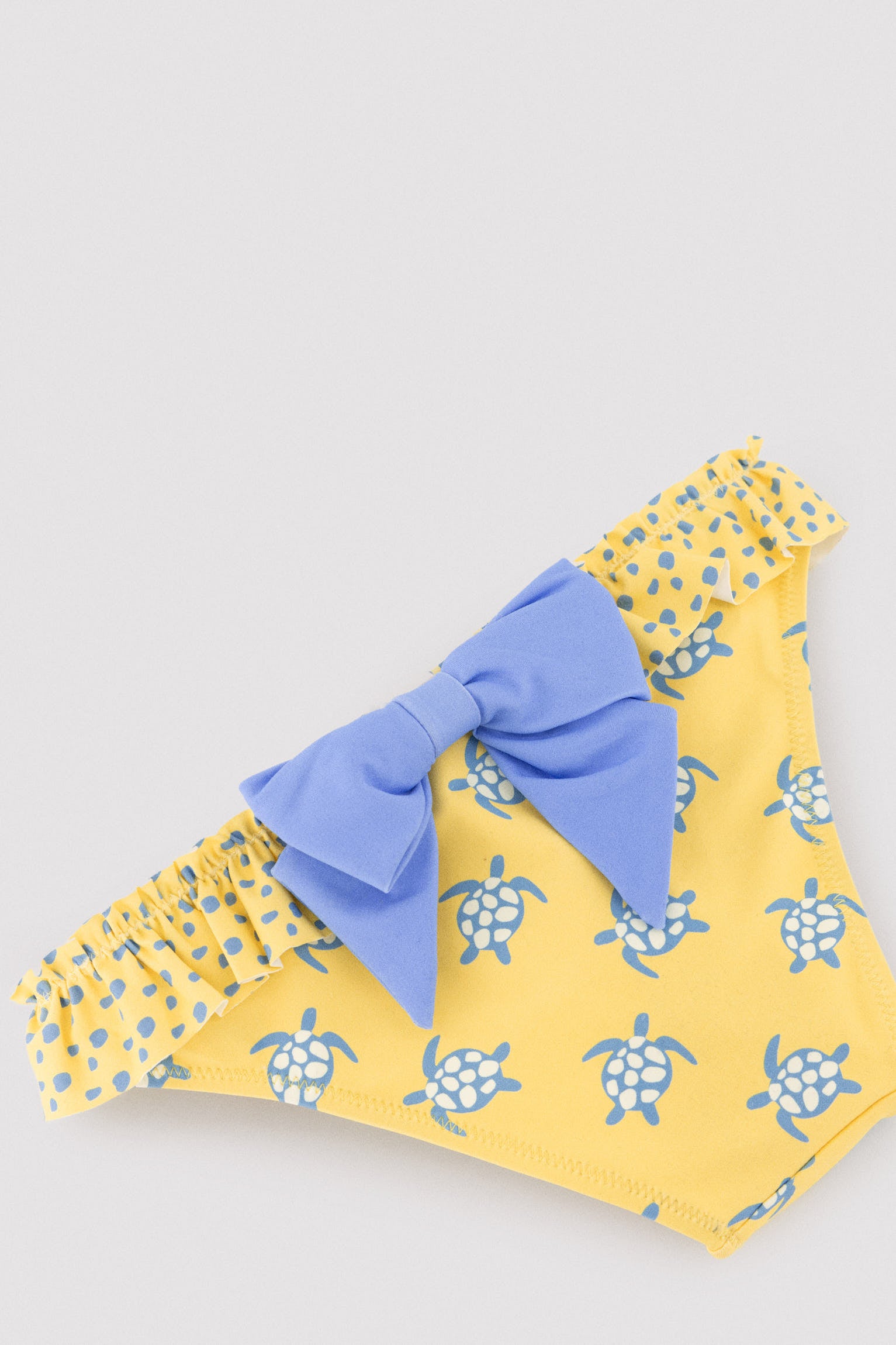 Culetín niña detalle volantes y lazos estampado tortugas - Ysabel Mora