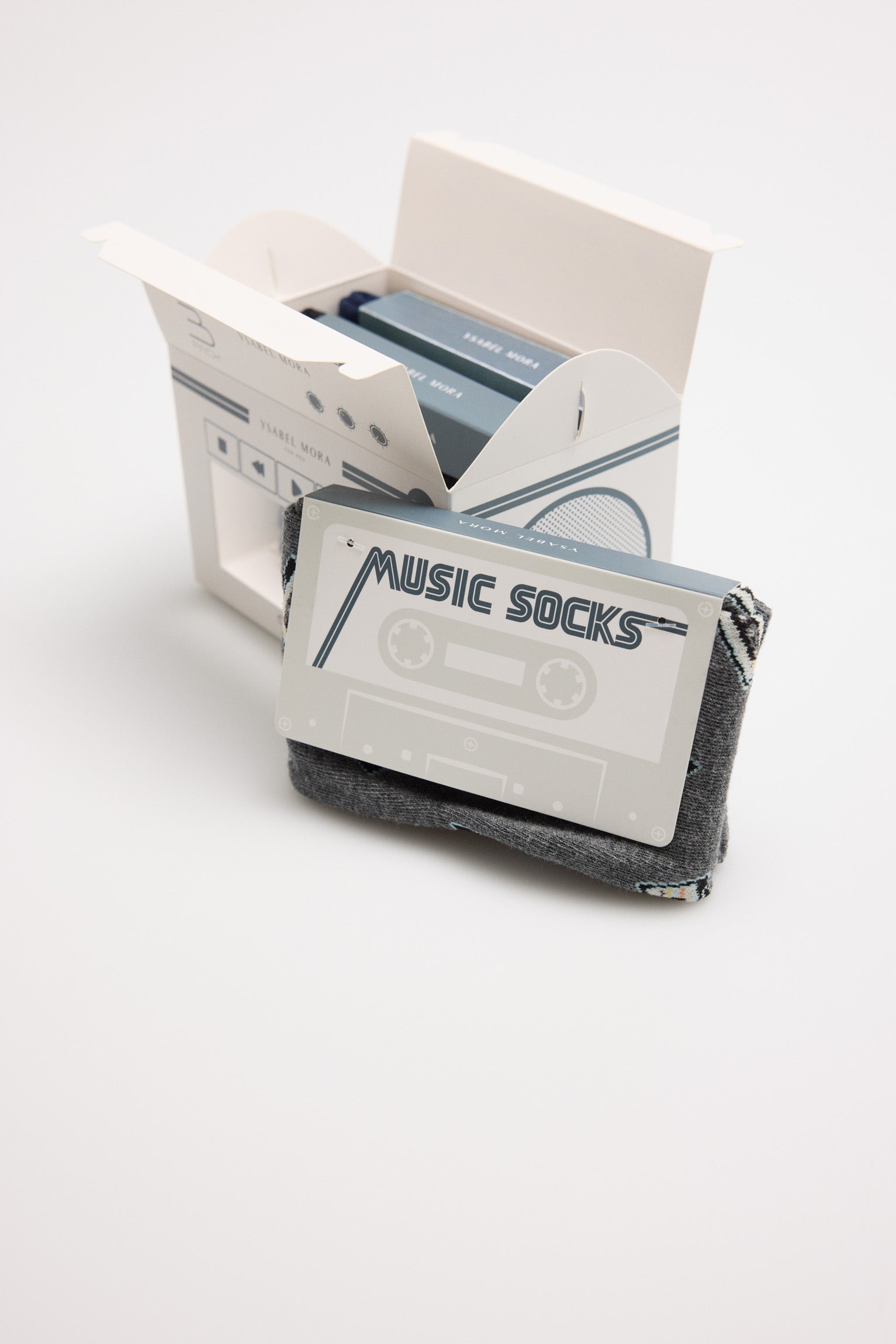 Pacote de presente com 3 meias estampadas musicais