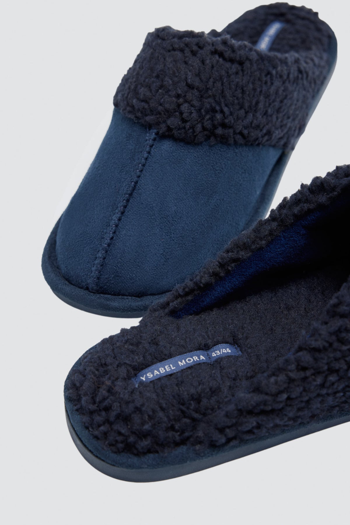Zapatillas de casa destalonadas con borreguito marino