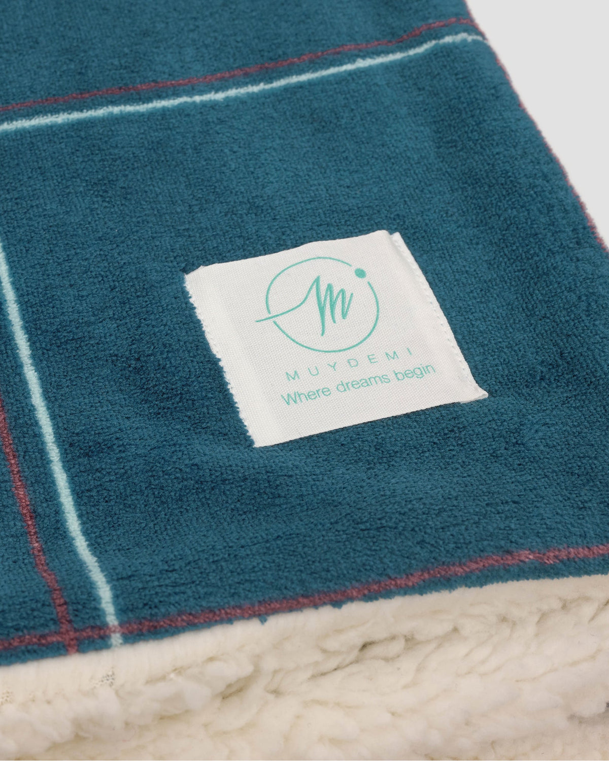 Manta em sherpa com estampado aos quadrados