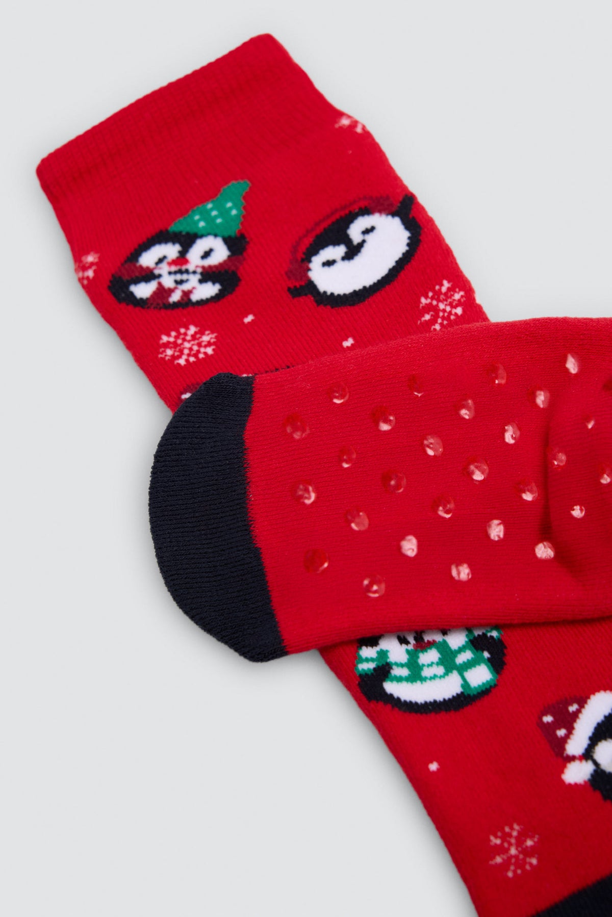 Pack de 2 meias infantis de Natal com renas e pinguins