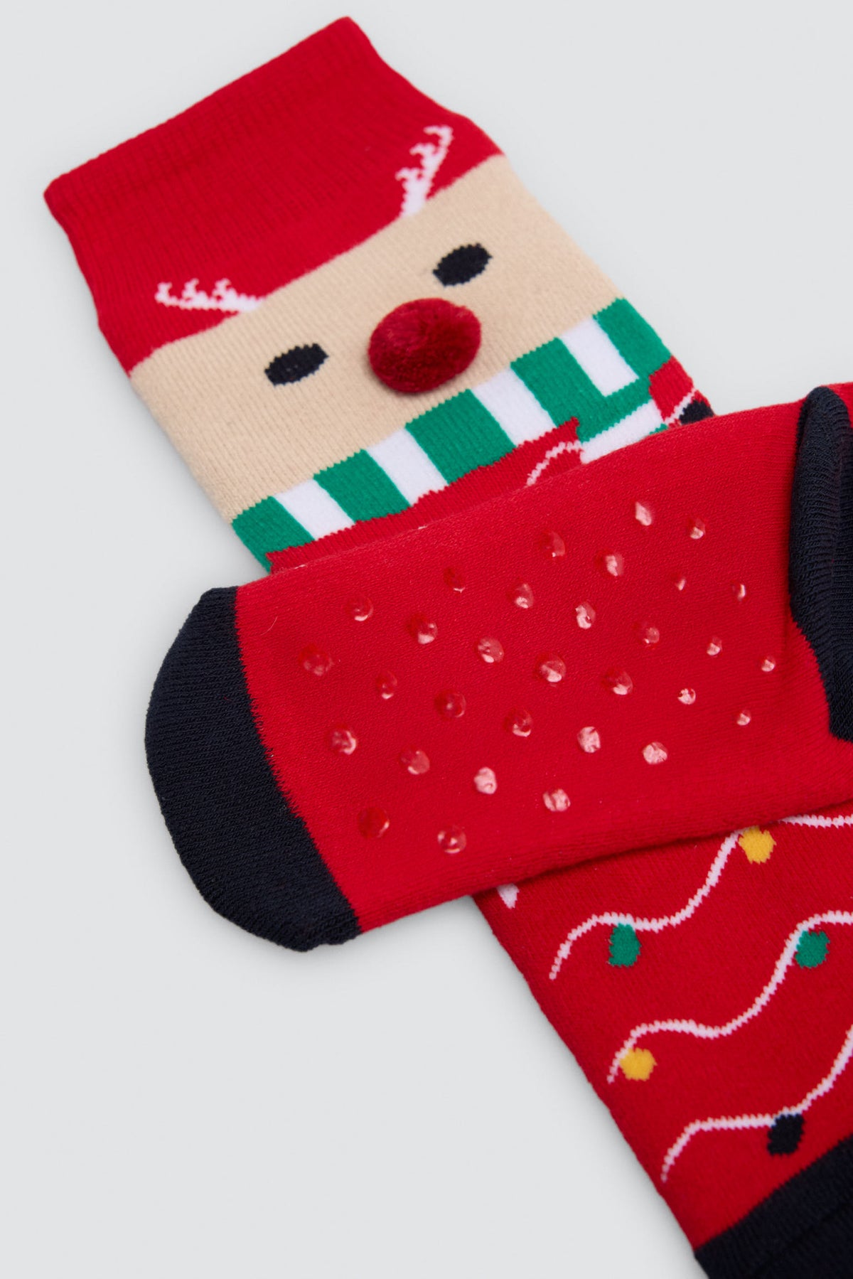Pack de 2 meias infantis de Natal com renas e pinguins
