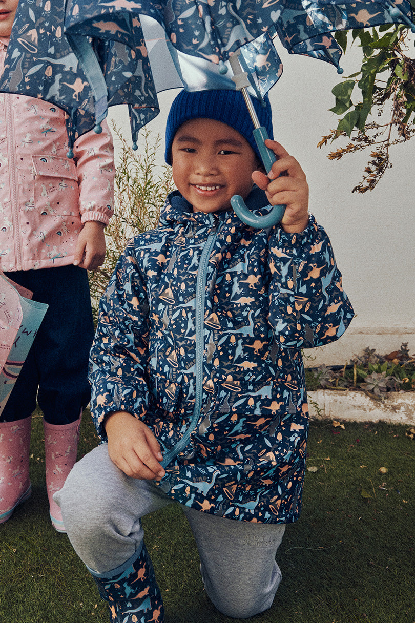 Capa de chuva infantil com forro de lã Dino