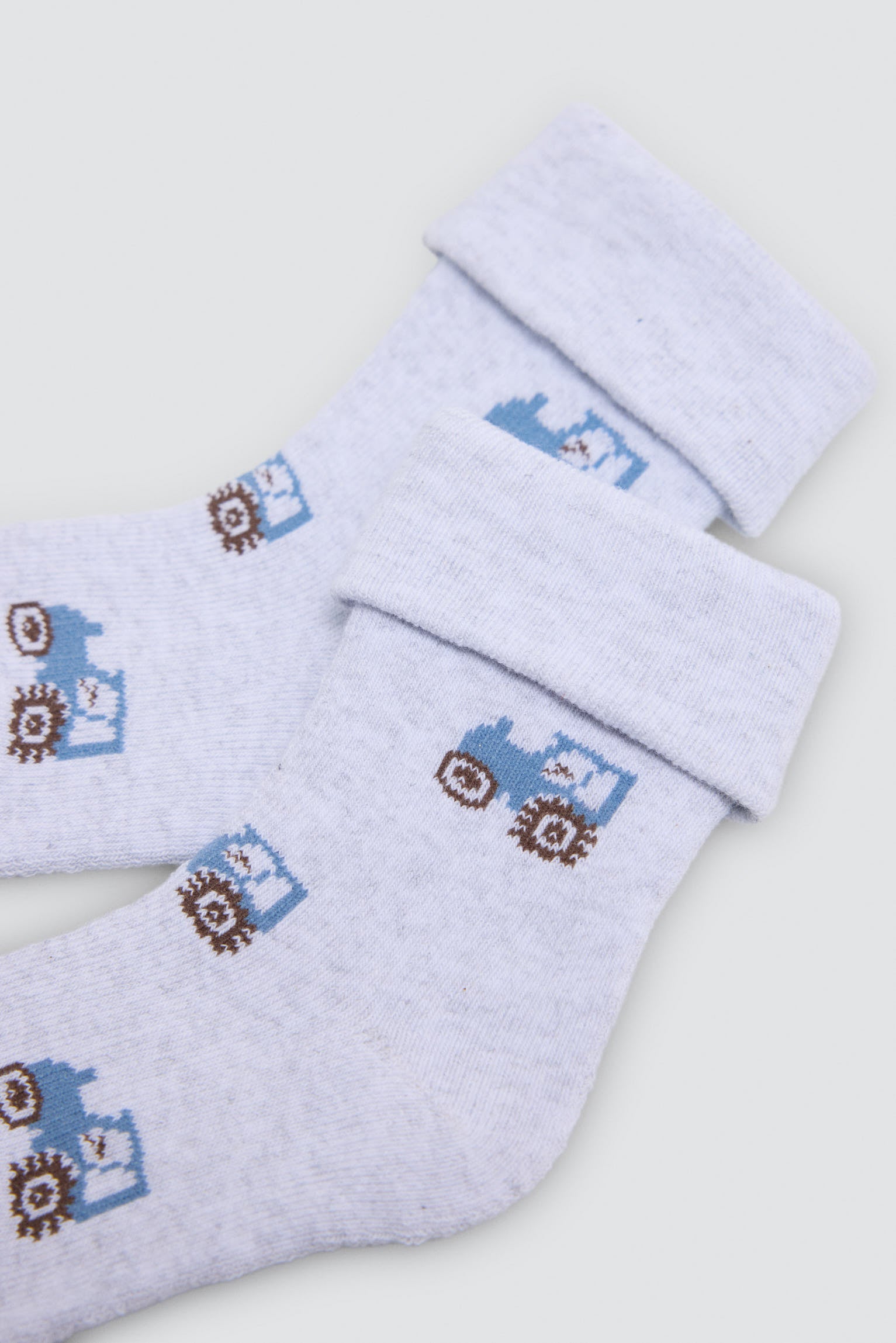 Pack de 4 meias térmicas de bebé com estampado de tratores e porcos
