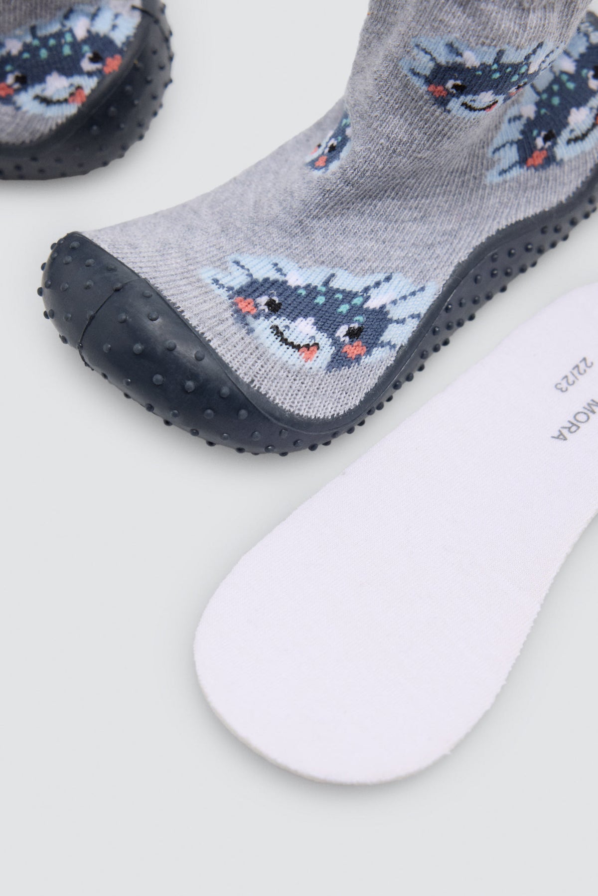 Meias-pantufa de bebé menino com estampado de dinossauros