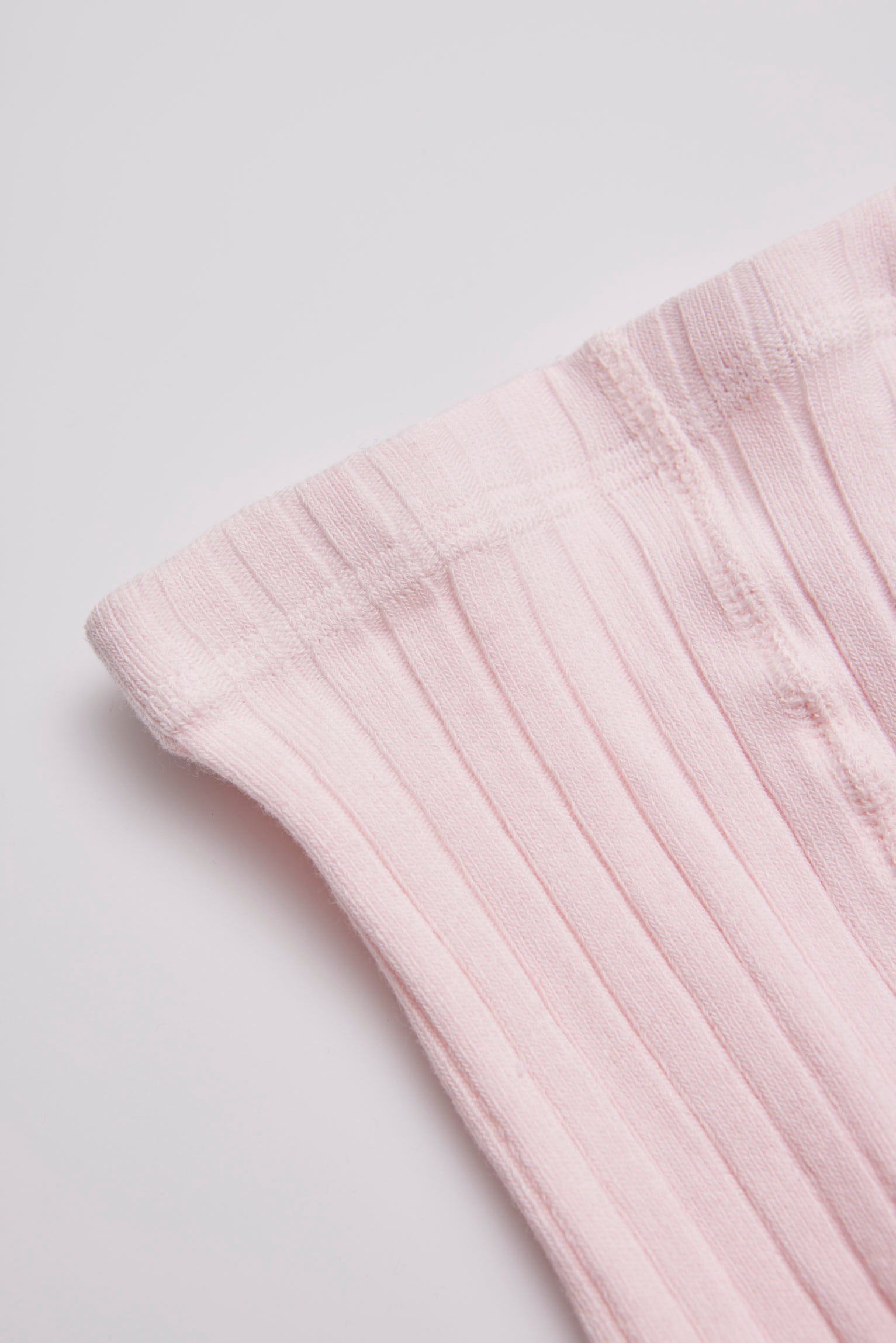 Collant canelado rosa claro