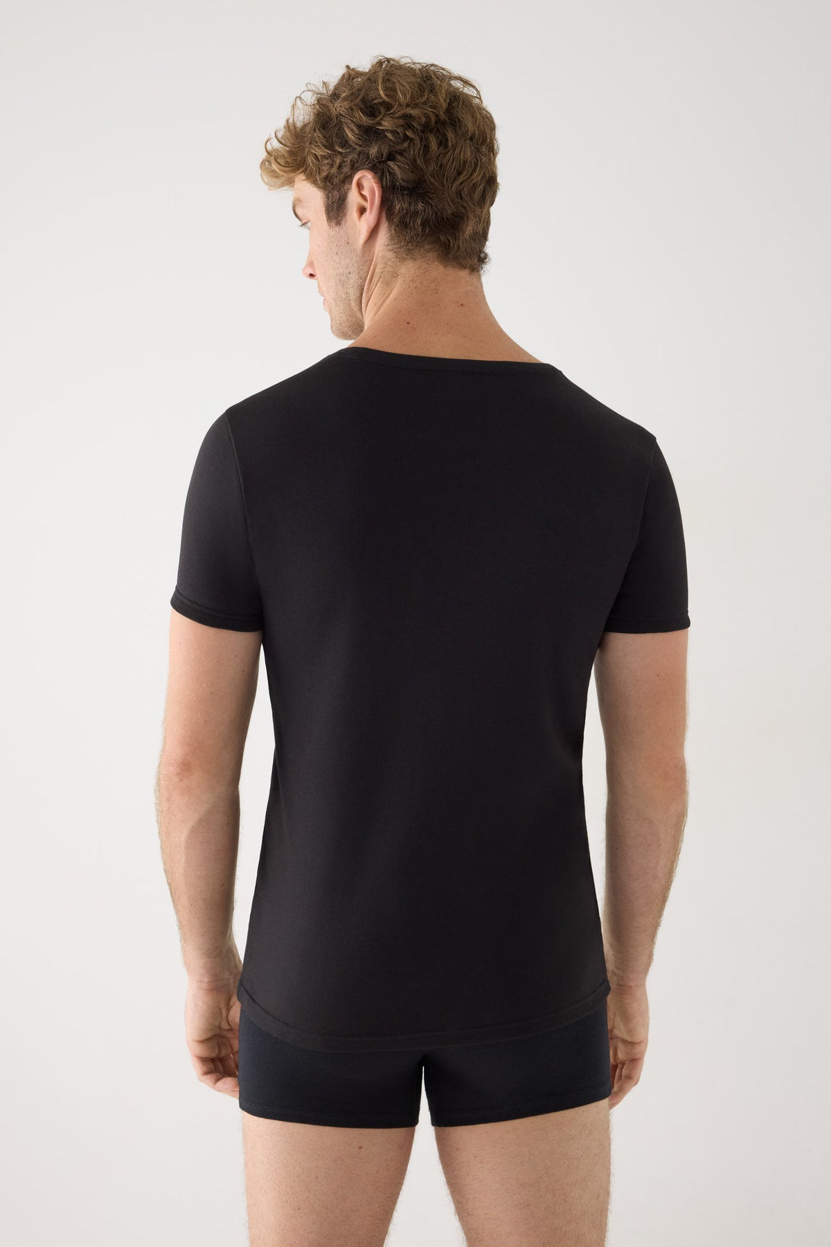 Camiseta térmica leve masculina de manga curta em algodão, preta.