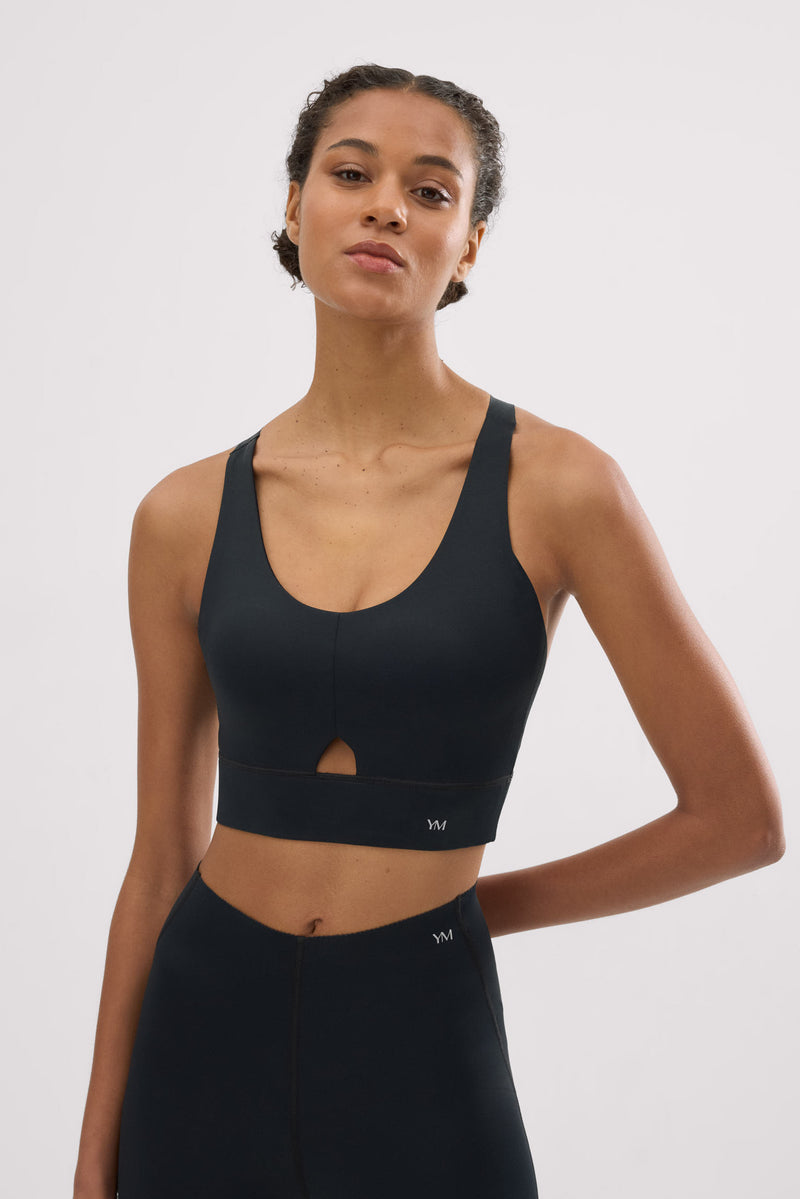 Sujetador deportivo compressive detalle abertura sujeción media negro - Ysabel Mora