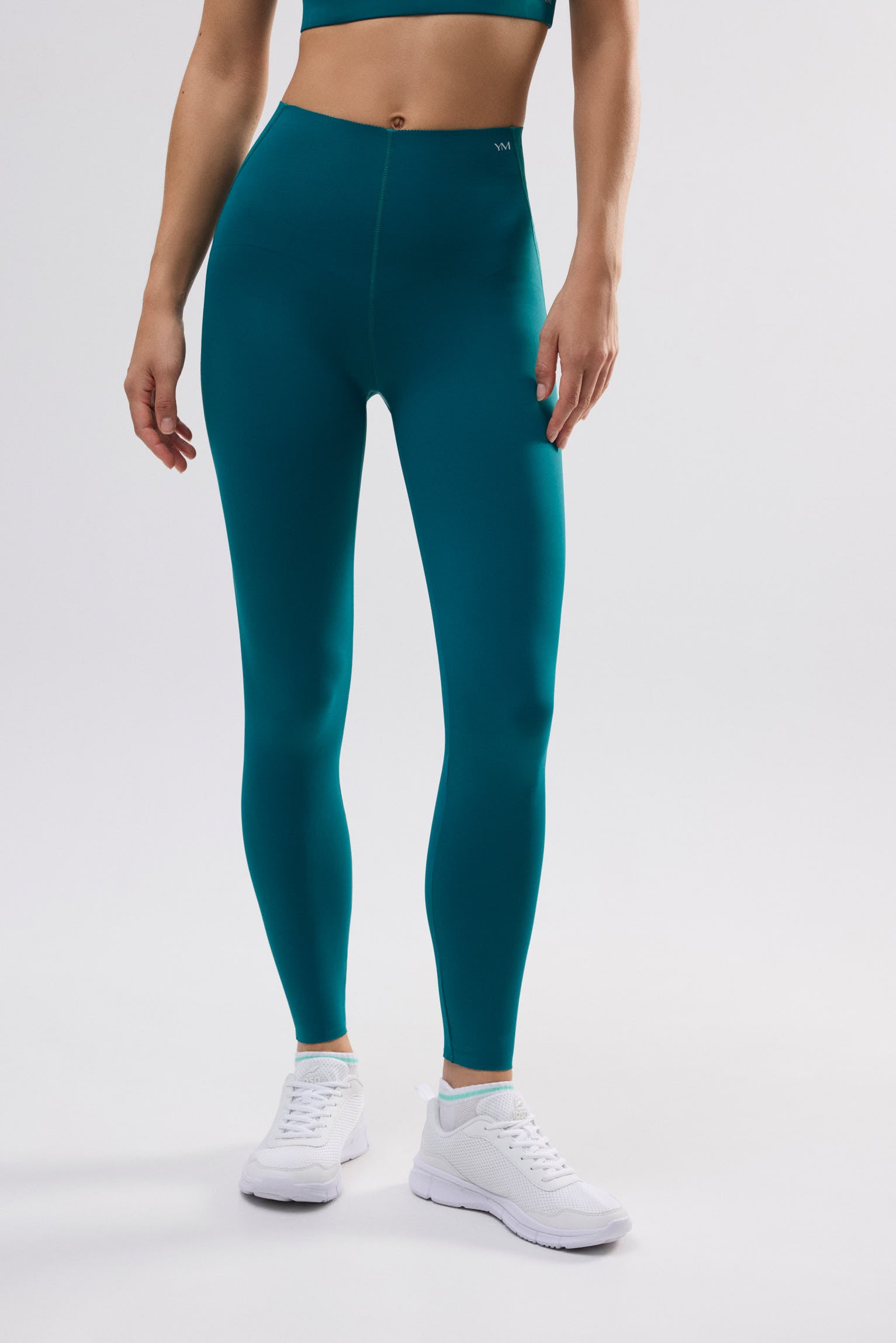 Leggings esportivos de compressão longos verdes com barriga lisa