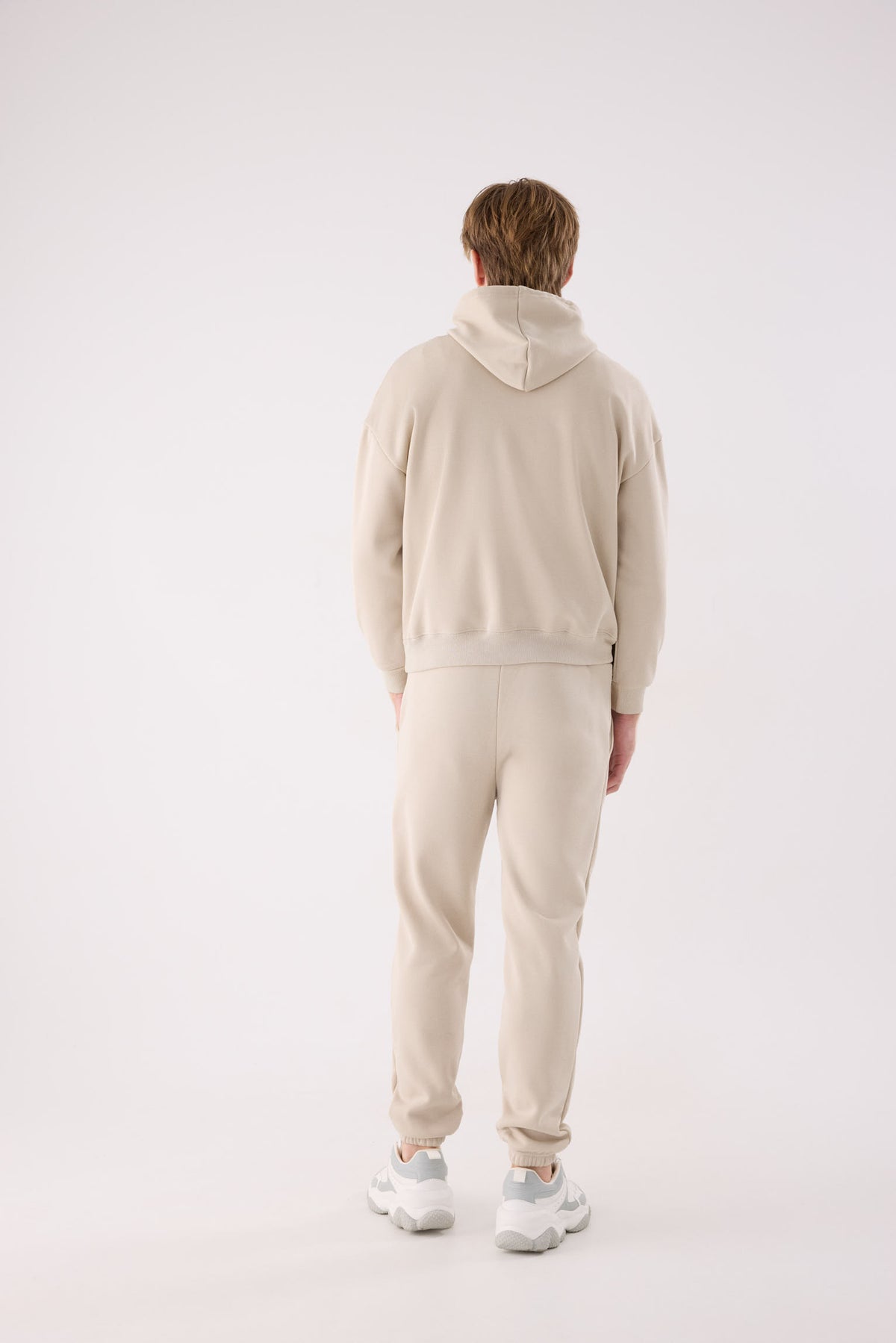 Calças jogger desportivas de homem bege cardadas com cintura ajustável