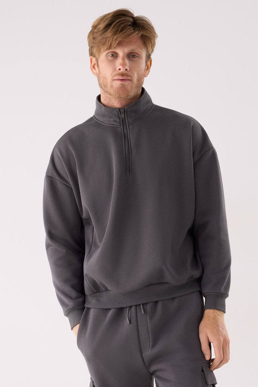 Sweatshirt desportiva de homem antracite cardada com meio fecho