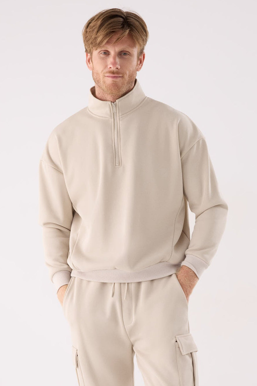 PRÉ-VENDA Sweatshirt desportiva de homem bege cardada com meio fecho