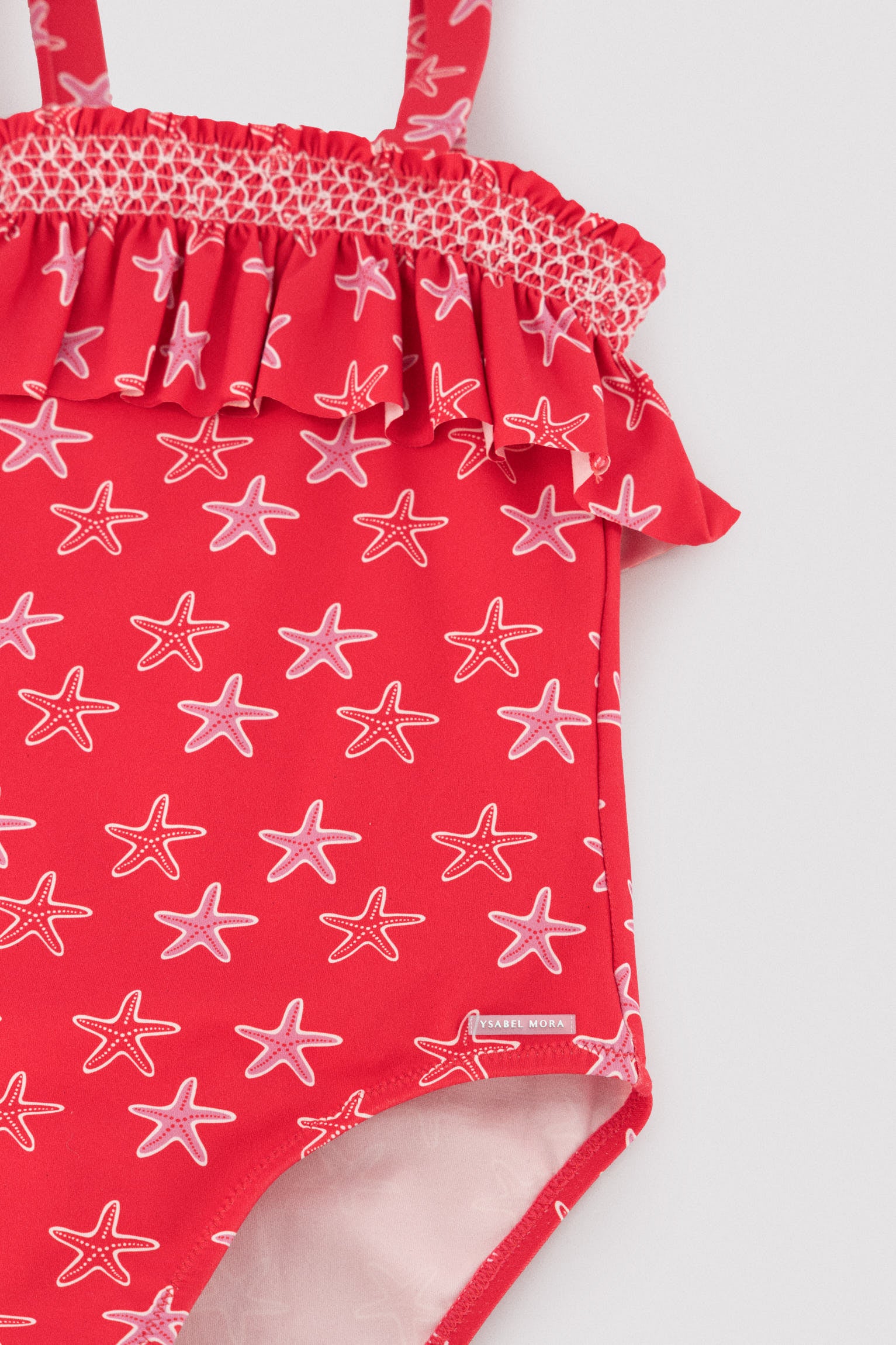 Maiô infantil com detalhe de babado e estampa de estrela-do-mar