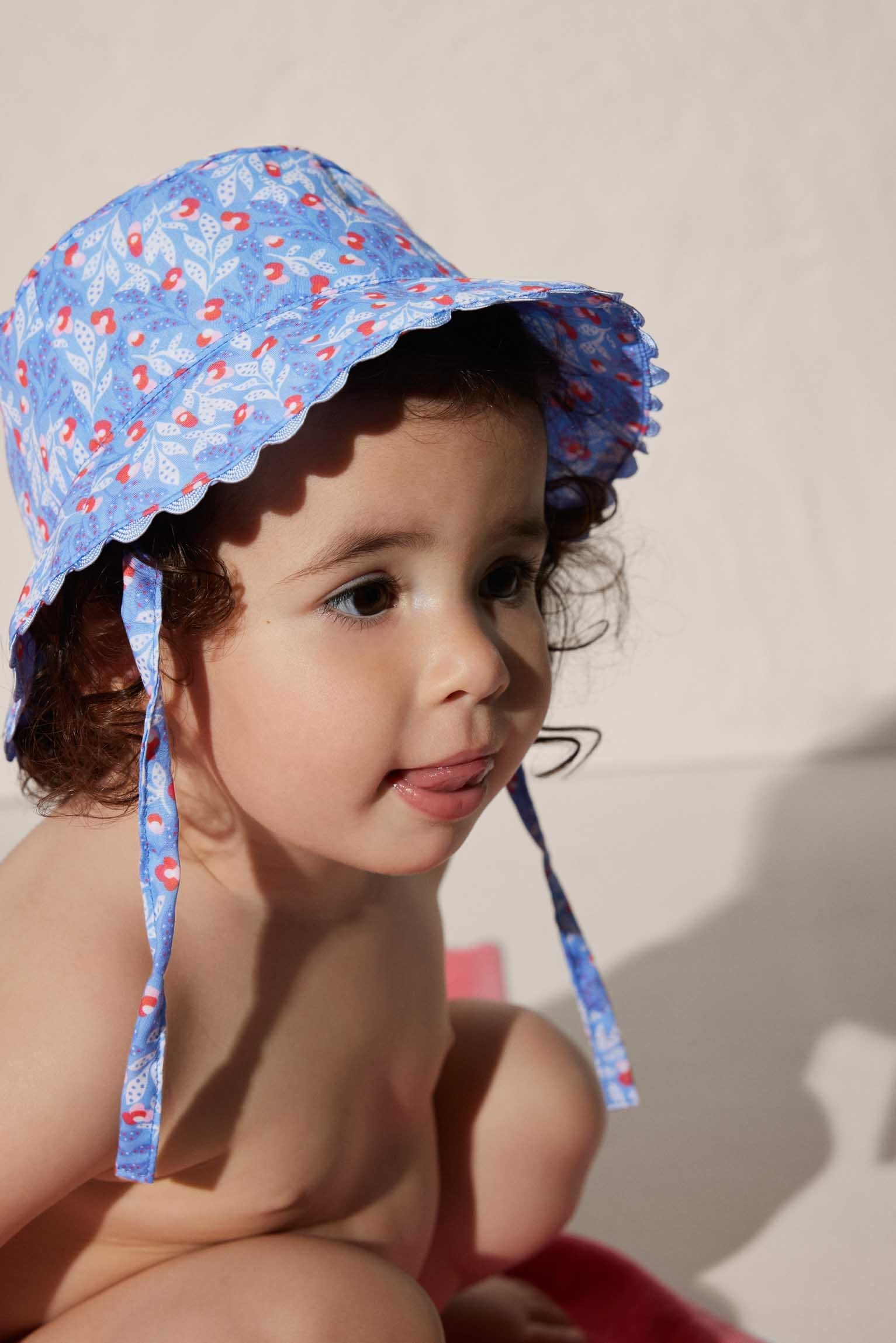 97531-1-gorro-bano-bebe-estampado-flores-ysabel-mora - Azul